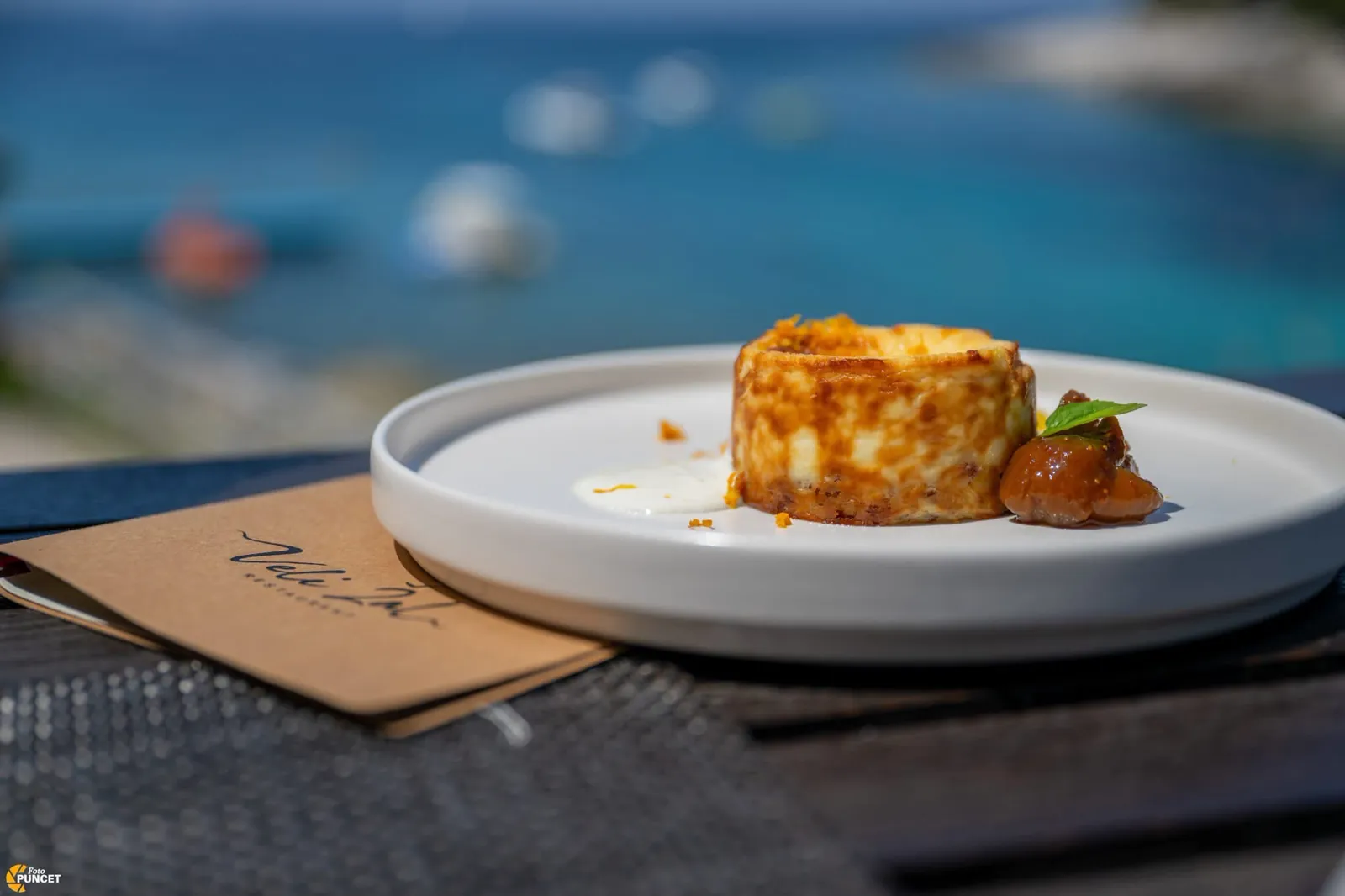 Dessert at Veli Žal with the sea of Lošinj behind